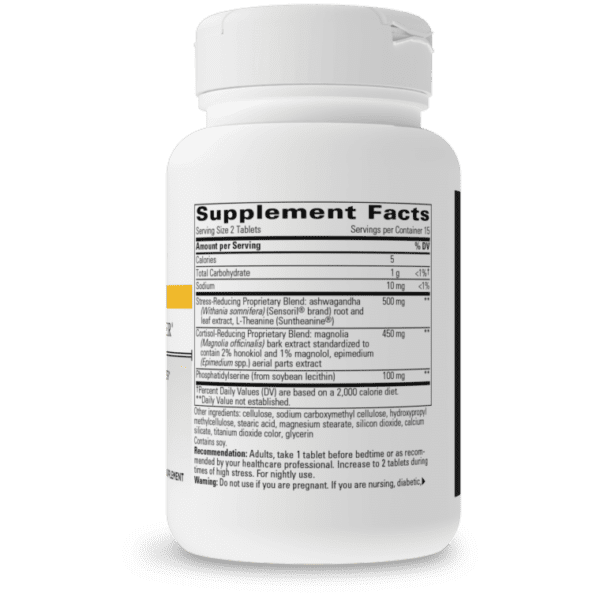 A bottle of supplement facts on a green background