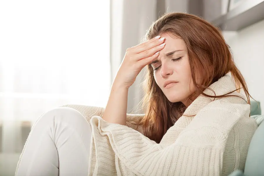 Young-Woman-With-Headache Young-Woman-With-Headache