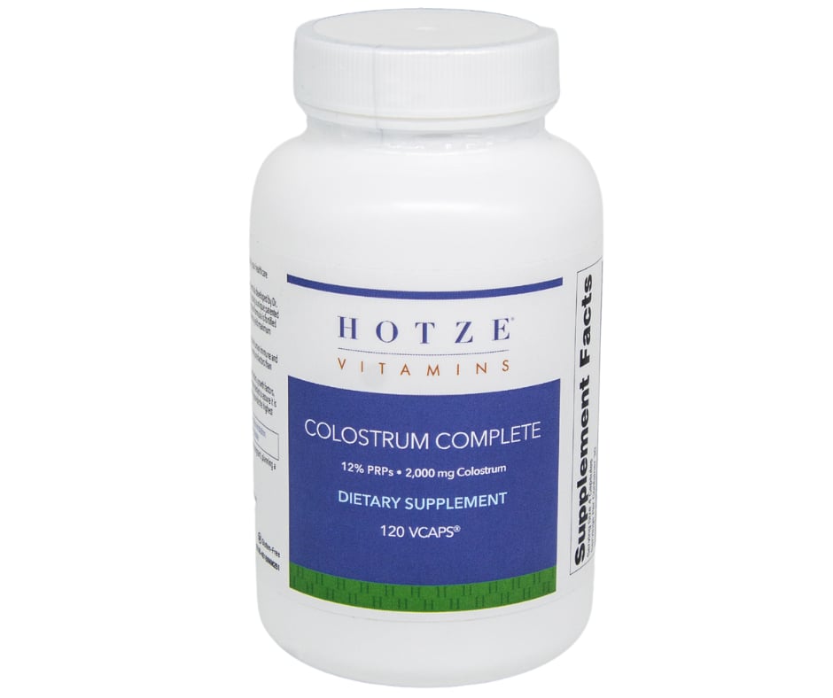 A bottle of colostrum complete is shown.
