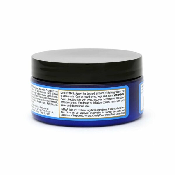 A blue container of face cream with black lid.