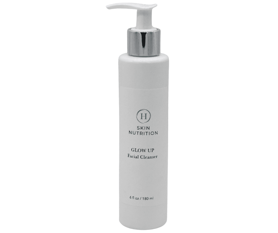 A white bottle of lotion with silver cap.