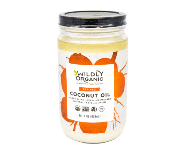 A jar of coconut oil with orange and white design.