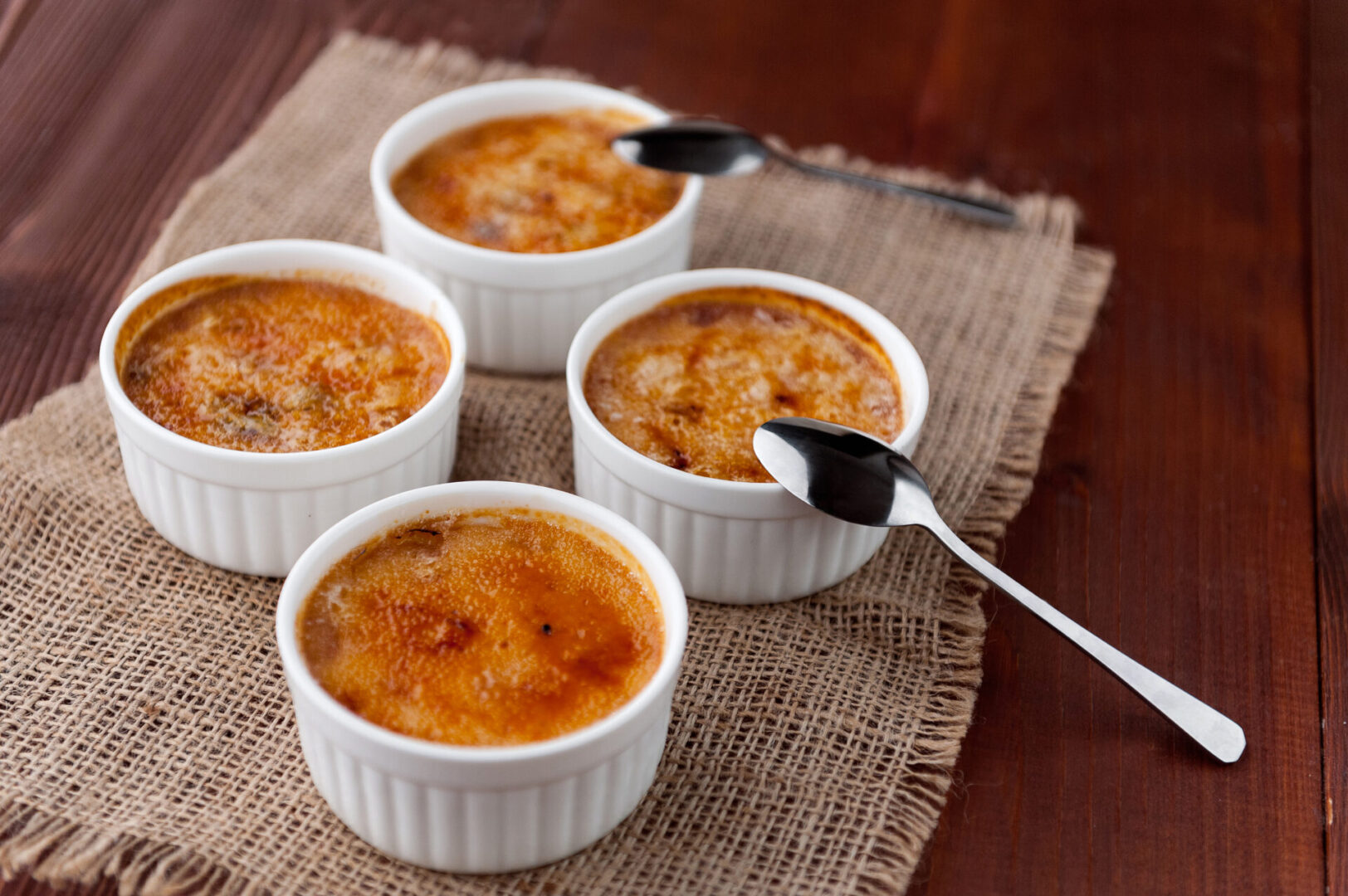 Creme brulee in a white bowl.