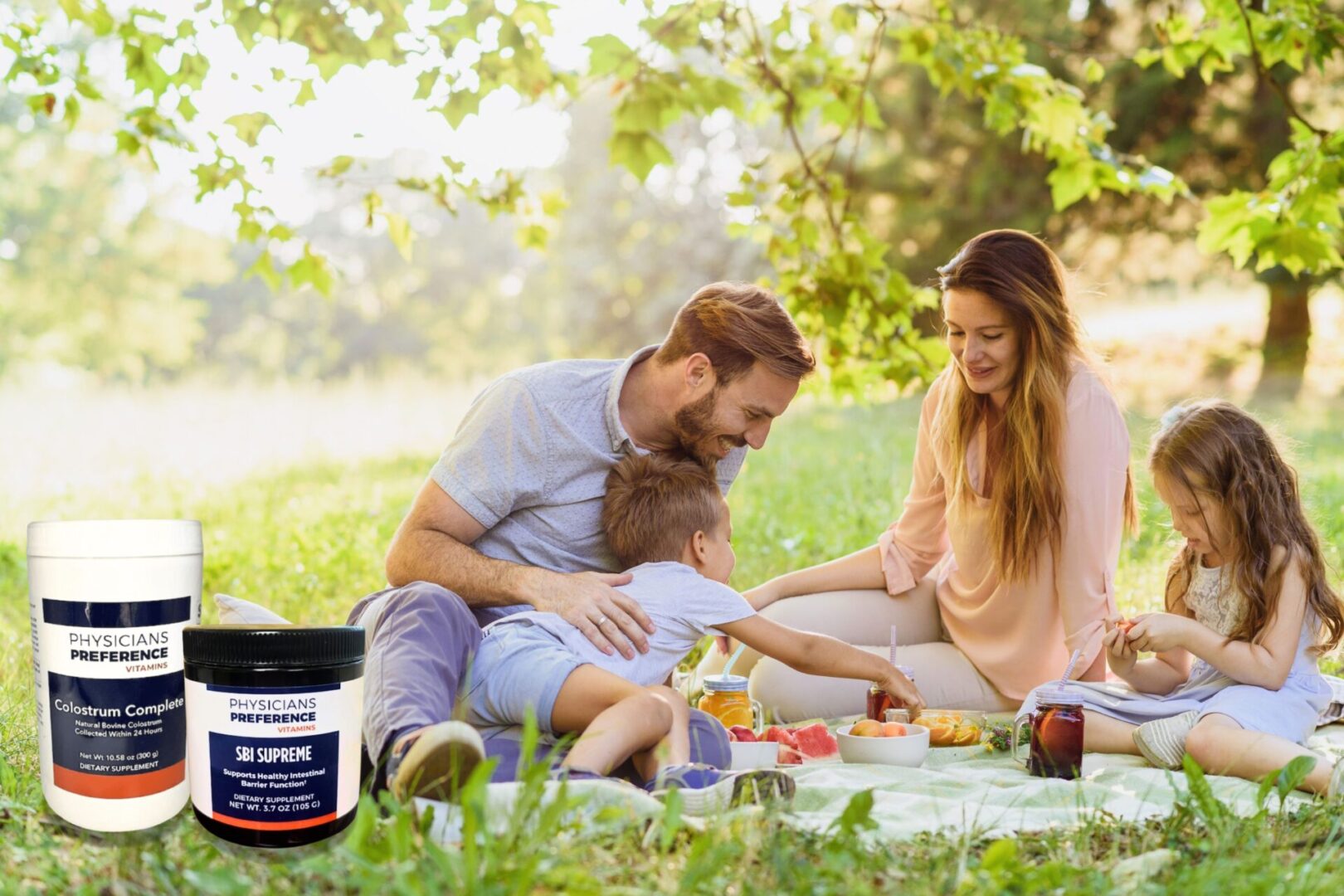 A young family enjoying a picnic on a beautiful spring day with colostrum by their side.