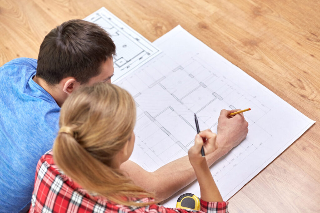 Couple looking to build the foundation of their house. minerals before vitamins concept