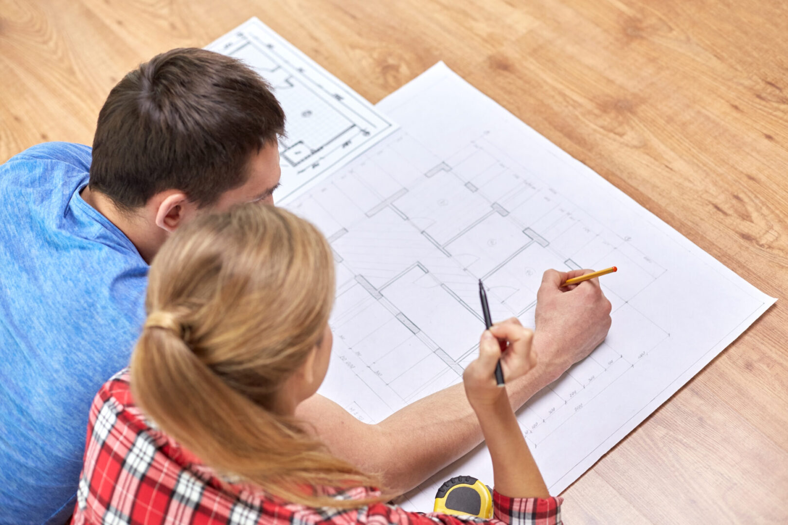 Couple looking to build the foundation of their house. minerals before vitamins concept