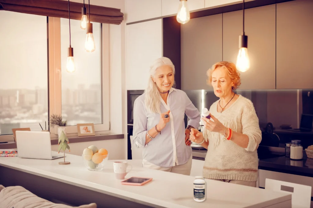 Woman reading a supplement label to learn how to choose quality supplements.