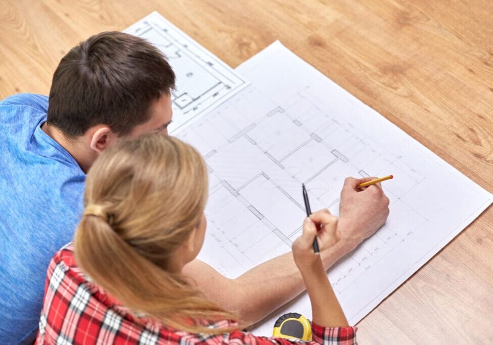 Couple looking to build the foundation of their house. minerals before vitamins concept