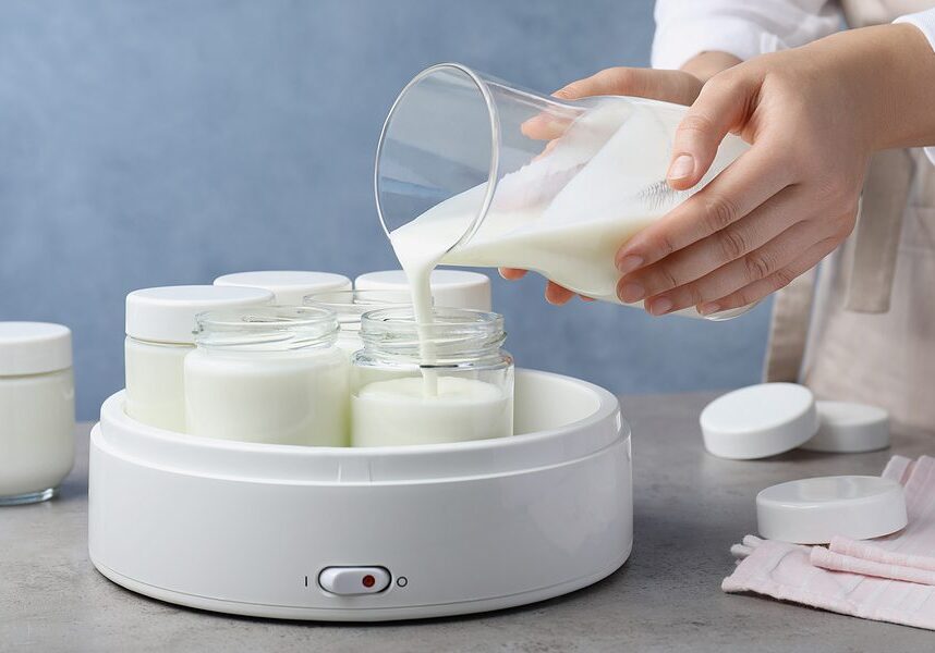Healthy Probiotic Yogurt Recipe woman making yogurt in yogurt machine